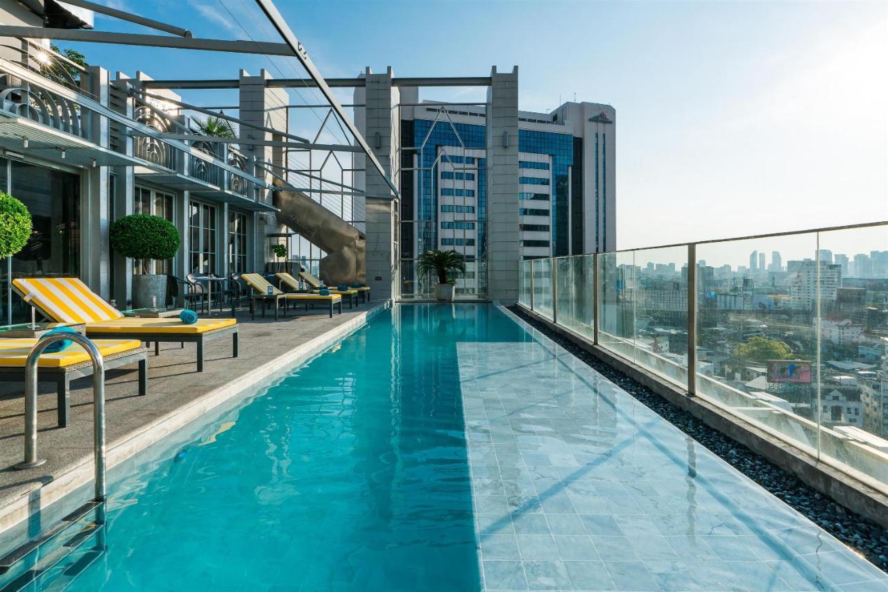 Akara Hotel Bangkok Exteriör bild Rooftop pool at the hotel